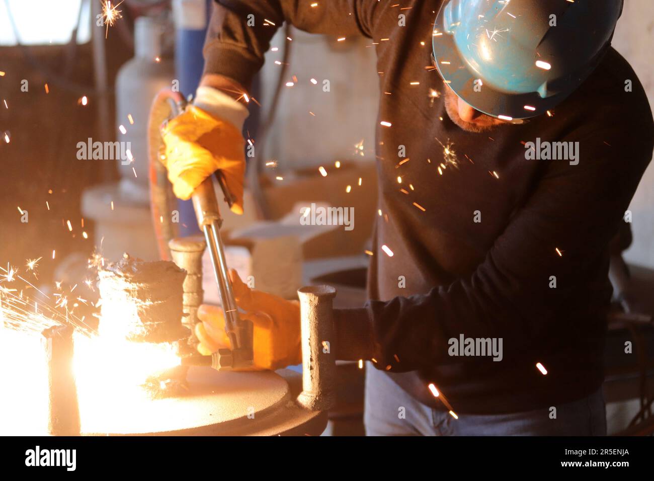 Welding works. Sparks, molten metal Stock Photo
