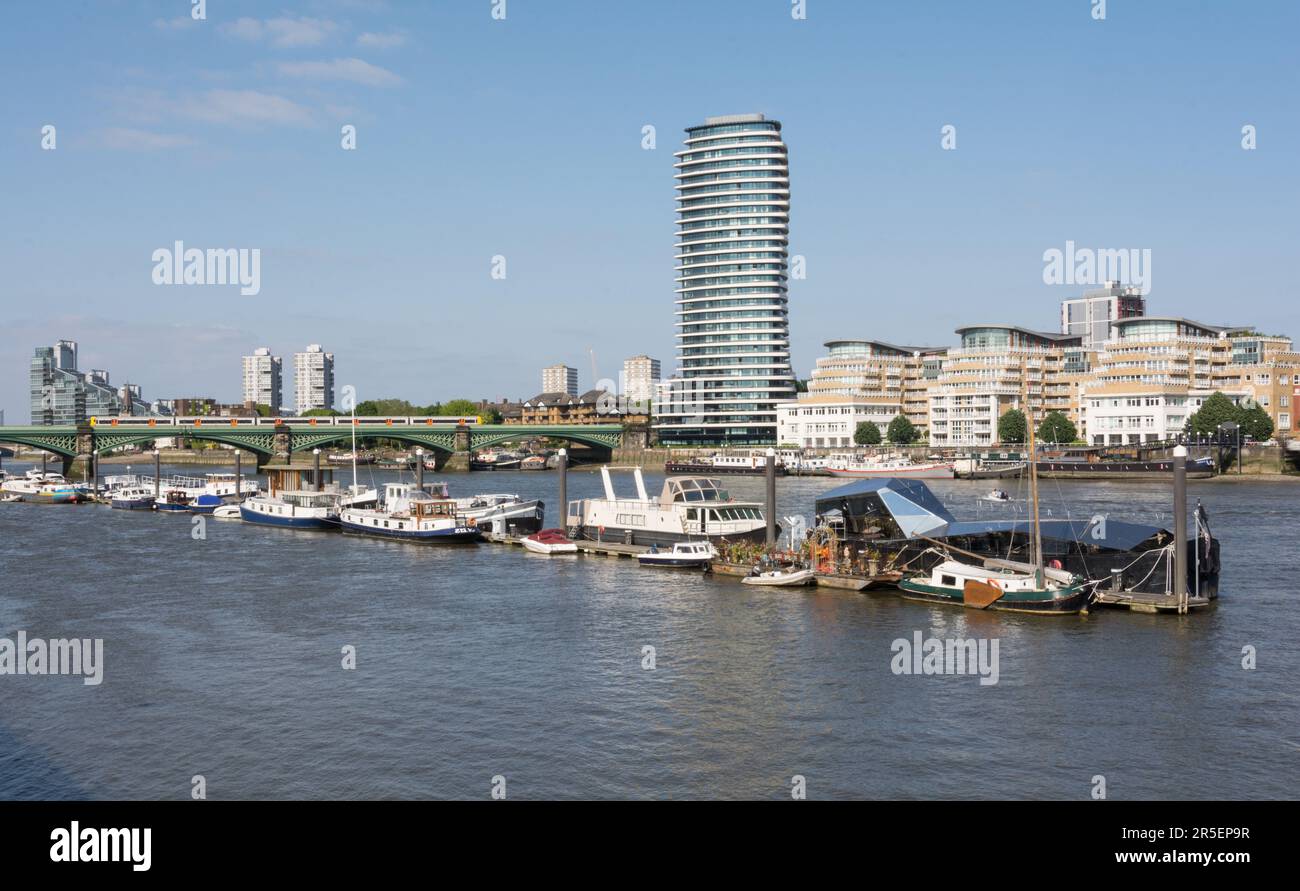 Houseboats and Lombard Wharf apartments on the River Thames, London