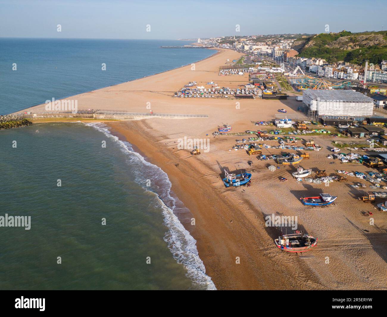 aerial view of fishing boats moored on the beach at the Stade in the old town of Hastings on the east sussex coast Stock Photo