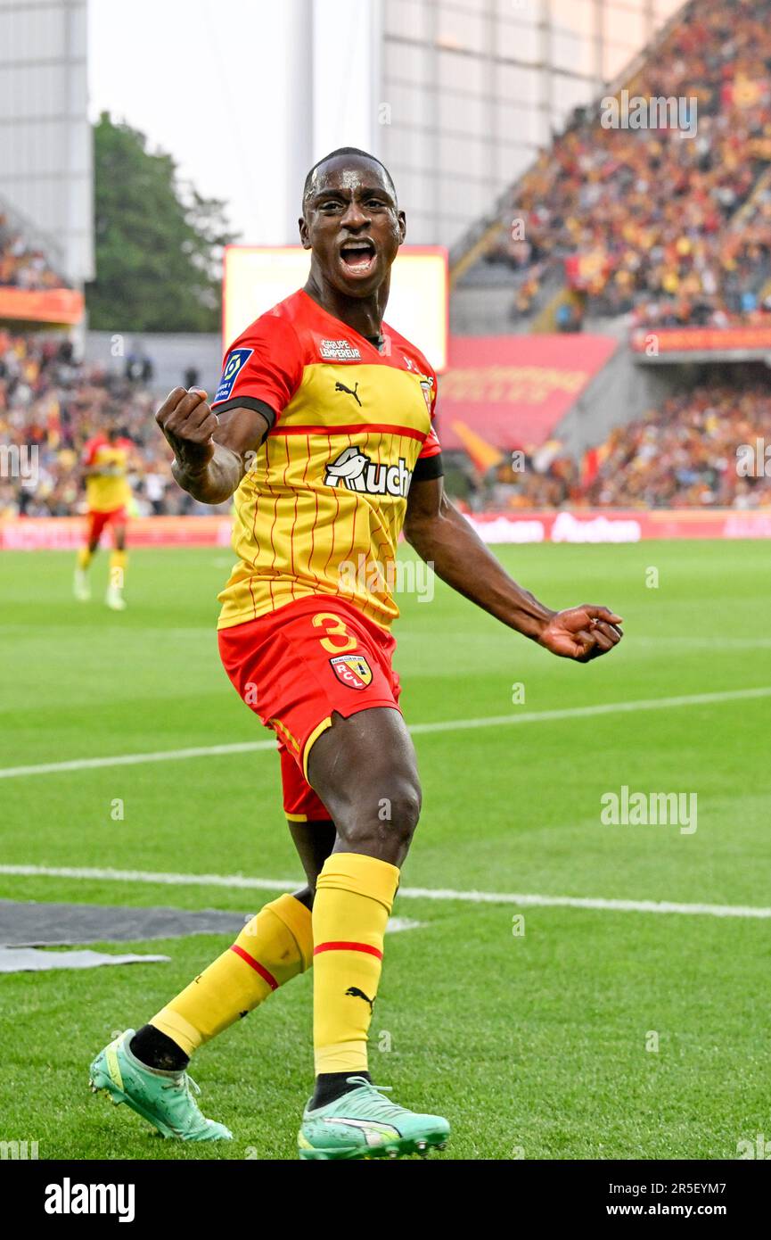 players of RC Lens and their president Joseph Oughourlian pictured  celebrating after winning and qualifying for the Champions League after a  soccer game between t Racing Club de Lens and AC Ajaccio