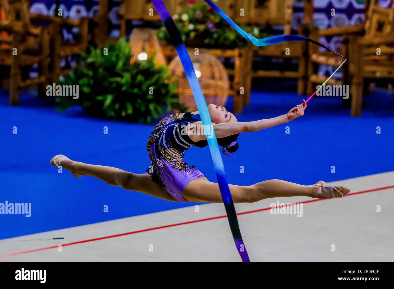 Manila. 3rd June, 2023. Kim Daeun of South Korea competes during the ribbon event of junior individual all-around final at the 14th Senior and 19th Junior Rhythmic Gymnastics Asian Championships in Manila, the Philippines on June 3, 2023. Credit: Rouelle Umali/Xinhua/Alamy Live News Stock Photo