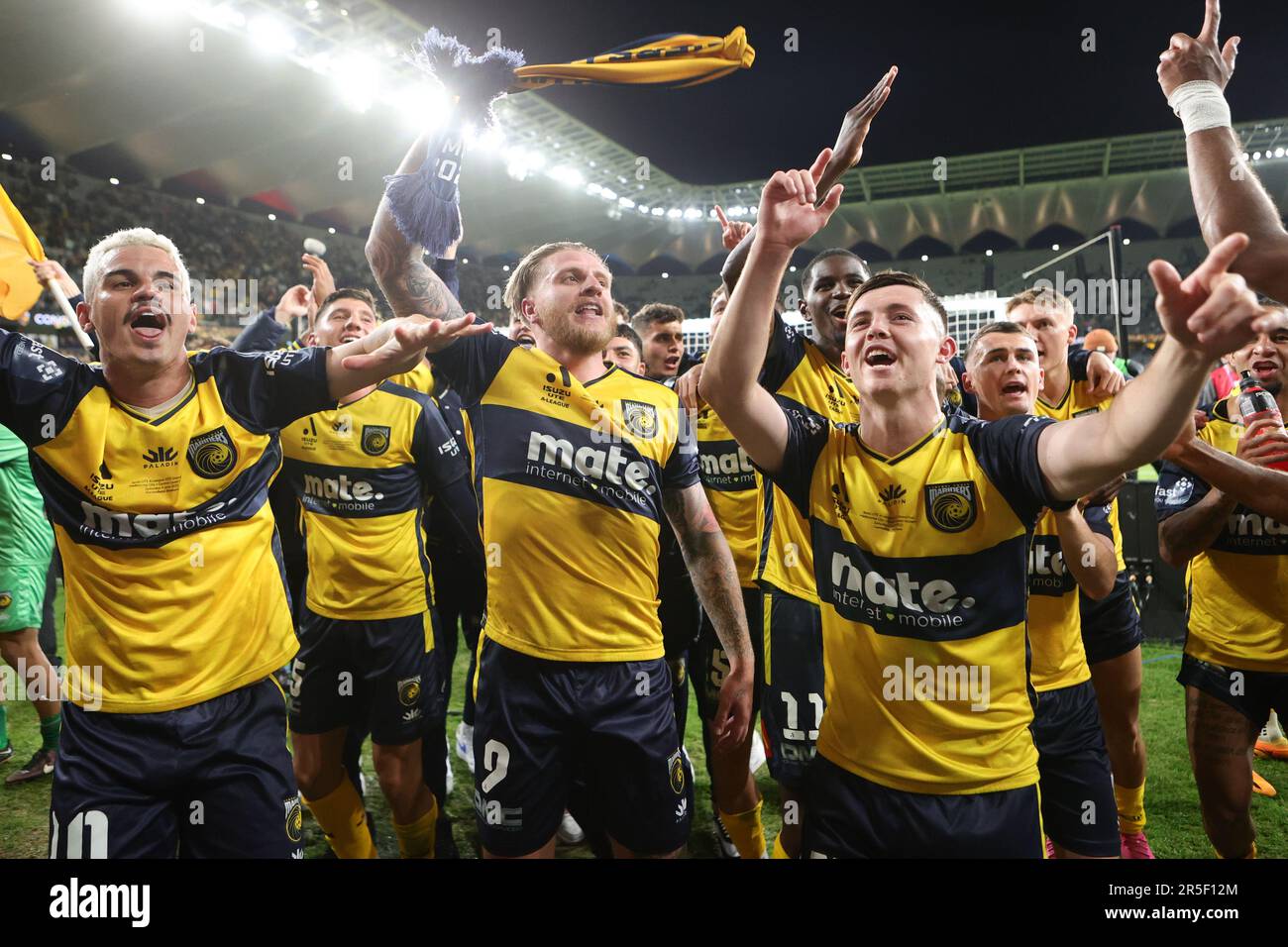 Sydney, Australia. 03rd June, 2023. Jason Cummings of Central Coast Mariners celebrates with fans and team mates after winning the Grand Final during the Isuzu UTE A-League 2023 Grand Final match between Melbourne City and Central Coast Mariners at the CommBank Stadium, Sydney, Australia on 3 June 2023. Photo by Peter Dovgan. Editorial use only, license required for commercial use. No use in betting, games or a single club/league/player publications. Credit: UK Sports Pics Ltd/Alamy Live News Stock Photo