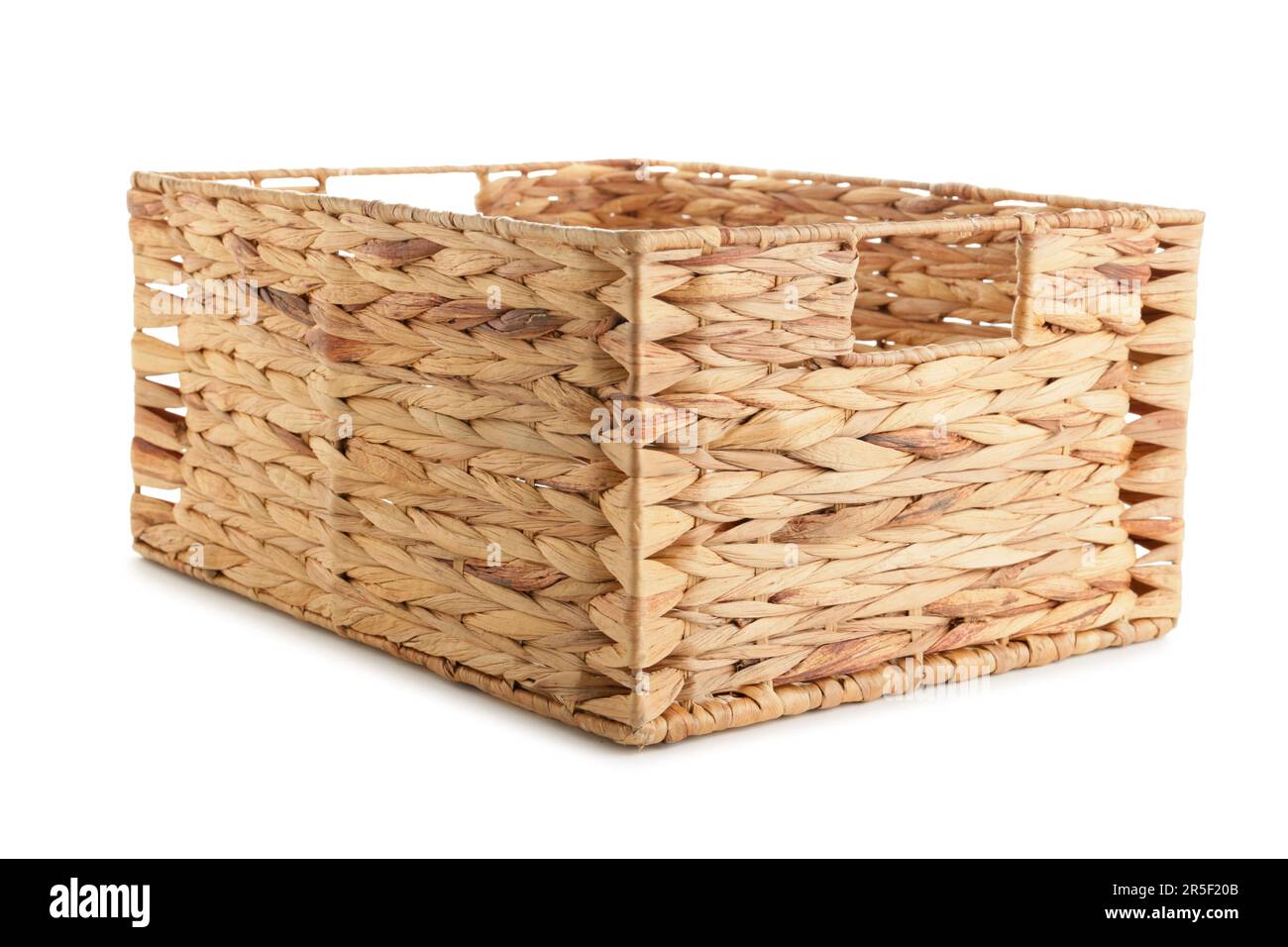 Empty wicker basket on white background Stock Photo - Alamy