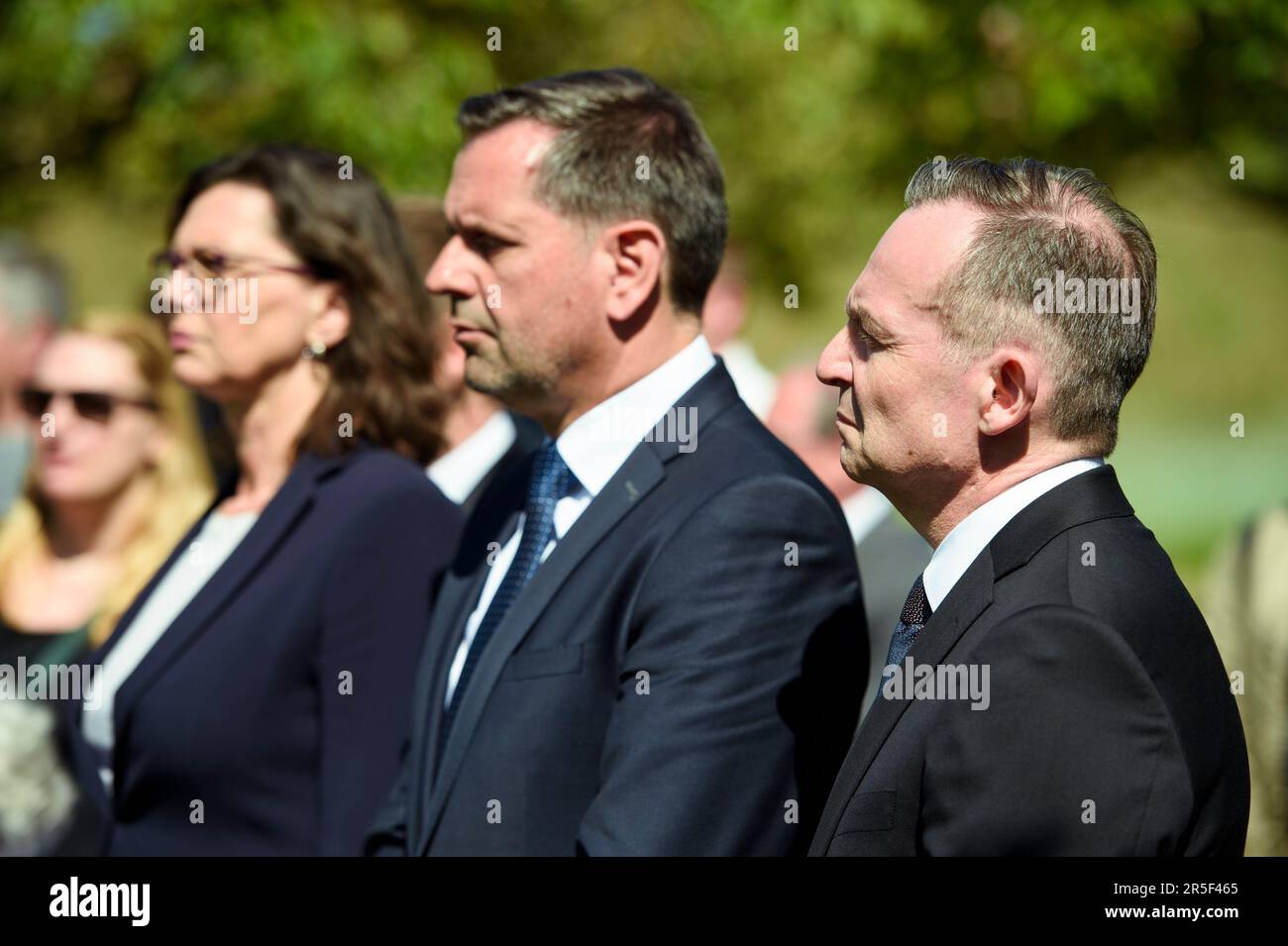 Eschede, Germany. 03rd June, 2023. Ilse Aigner (CSU, l-r), President of the Bavarian Parliament, Olaf Lies (SPD), Economics Minister of Lower Saxony, and Volker Wissing (FDP), Federal Minister of Transport and Digital Affairs, stand at the memorial for victims of the Eschede ICE accident on the 25th anniversary. On June 03, 1998, after a wheel tire broke in Eschede, Lower Saxony, several carriages of an ICE train crashed into a road bridge at a speed of 200. 101 people died. Credit: Gregor Fischer/dpa/Alamy Live News Stock Photo
