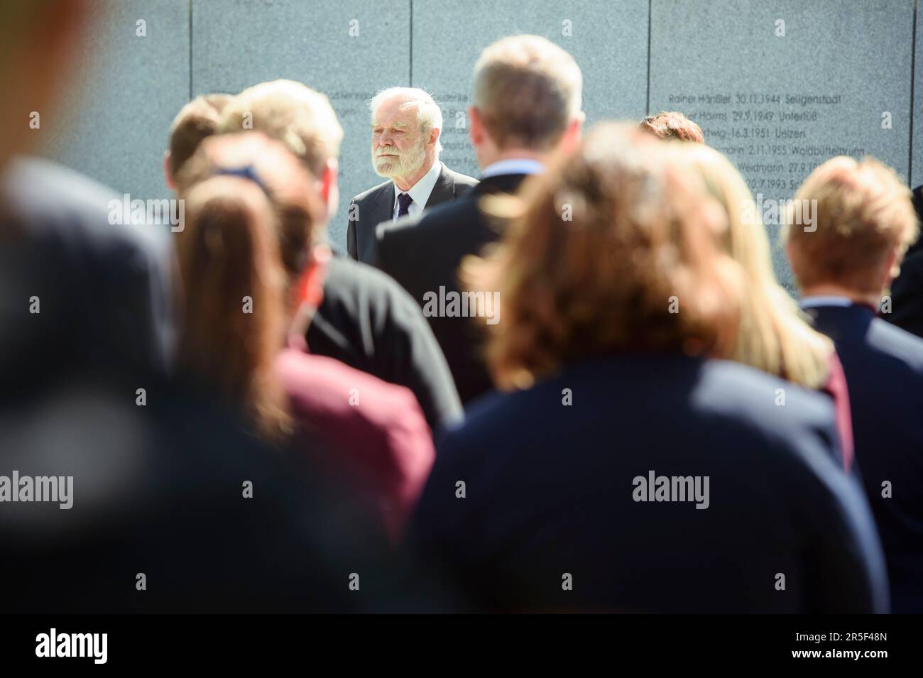 Eschede, Germany. 03rd June, 2023. Heinrich Löwen, spokesman for Selbsthilfe Eschede, greets guests at the 25th anniversary memorial for the victims of the Eschede ICE accident. On June 3, 1998, after a wheel tire broke in Eschede in Lower Saxony, several rail cars of an ICE train collided with a road bridge at a speed of 200. 101 people die. Credit: Gregor Fischer/dpa/Alamy Live News Stock Photo