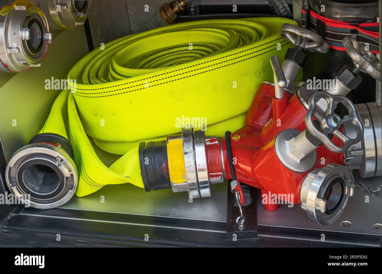 Emergency equipment inside a red fire truck Stock Photo - Alamy