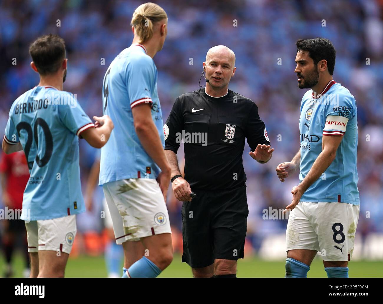 Manchester City's Bernardo Silva, Erling Haaland and Ilkay Gundogan
