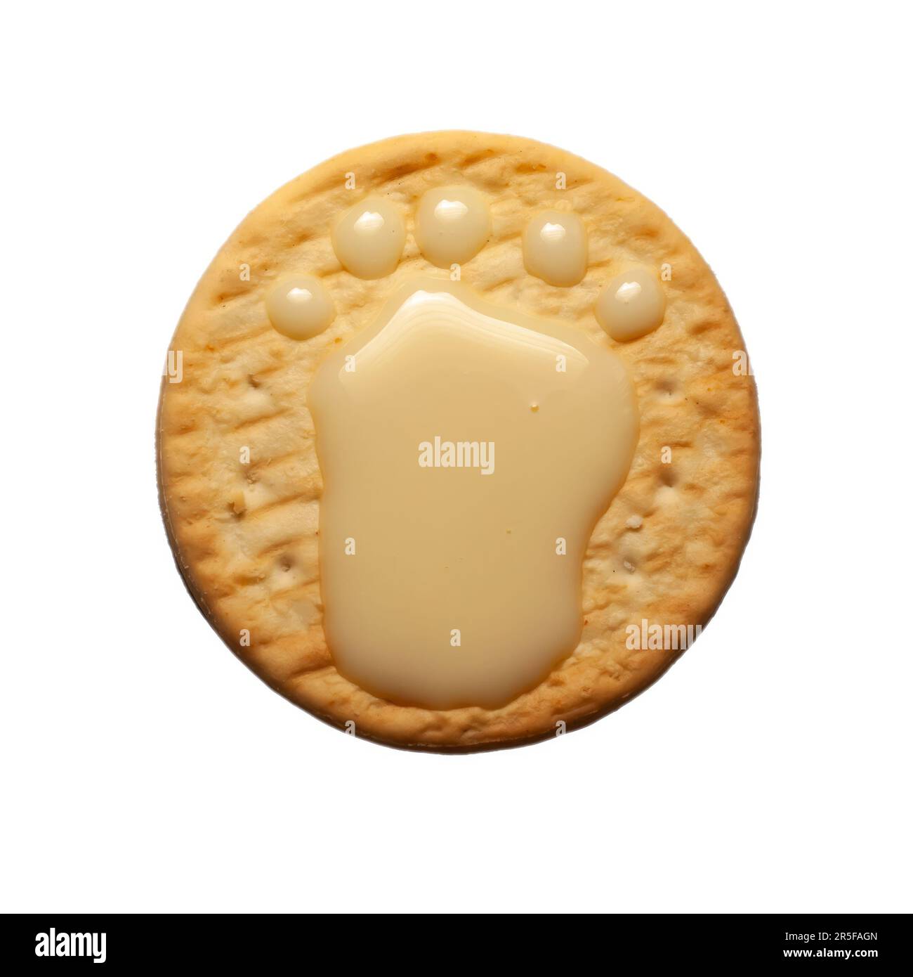 Round cracker with condensed milk in the shape of a leg. Sweets like a