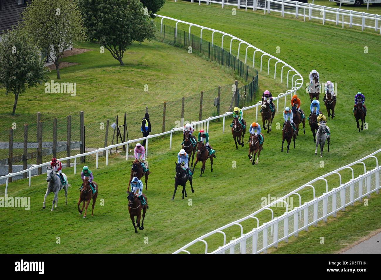 Runners and riders return after The Aston Martin "Dash" Handicap during
