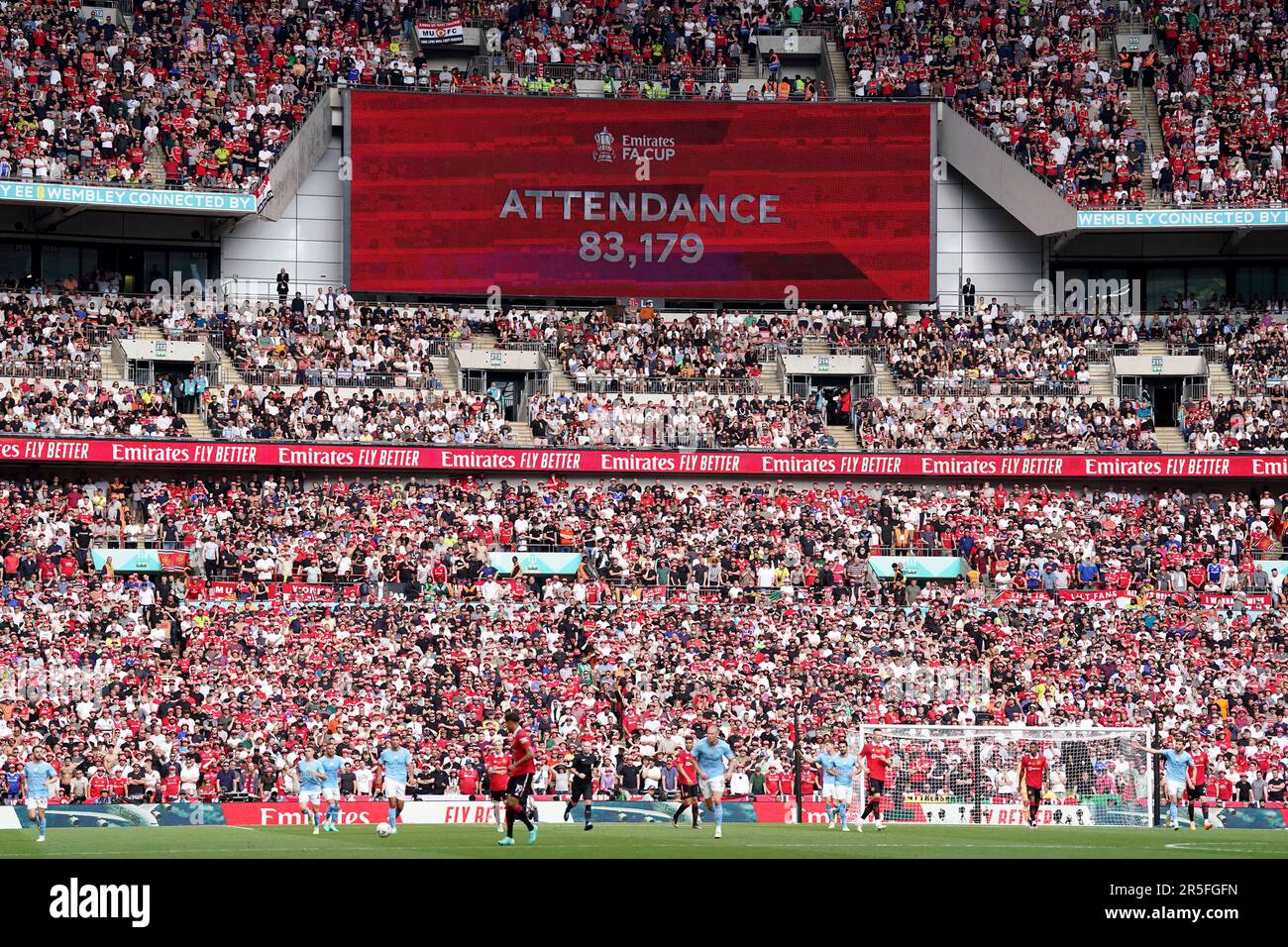 The attendance of 83,179 is displayed on the giant screen during the