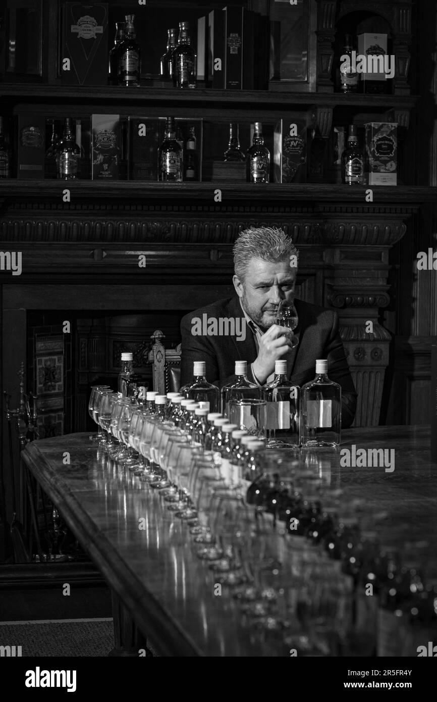 Master blender Sandy Hyslop at the Strathisla Distillery in Keith, the oldest continuously operating distillery in Scotland, Aberdeenshire, Scotland. Stock Photo