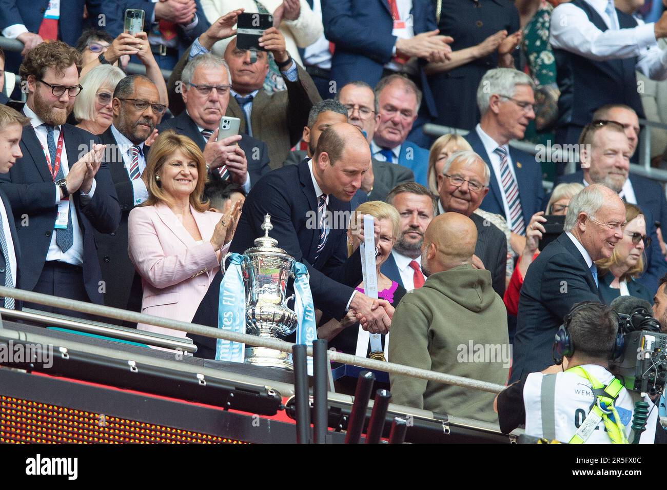 London, UK. 03rd June, 2023. HRH The Price of Wales congratulates Josep Guardiola manager of Manchester City during the The FA Cup Final match between Manchester City and Manchester United at Wembley Stadium, London, England on 3 June 2023. Photo by Salvio Calabrese. Editorial use only, license required for commercial use. No use in betting, games or a single club/league/player publications. Credit: UK Sports Pics Ltd/Alamy Live News Stock Photo