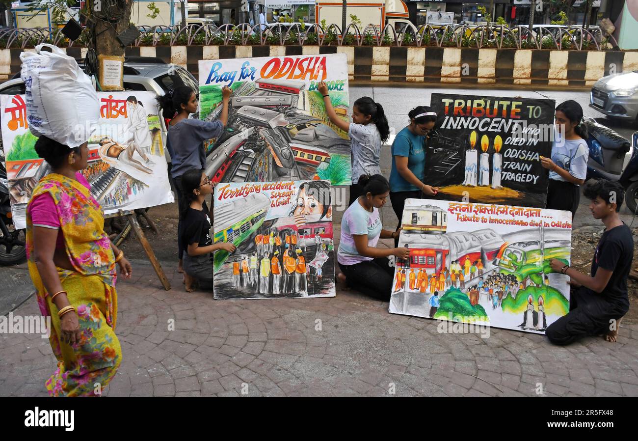 Students from Gurukul school of art paint posters paying tribute to people who died in the train accident in Odisha's Balasore district. 288 people died and 803 got injured in Shalimar-Chennai Central Coromandel Express, Bengaluru-Howrah Superfast Express and a goods train triple train accident in Odisha's Balasore district. Stock Photo