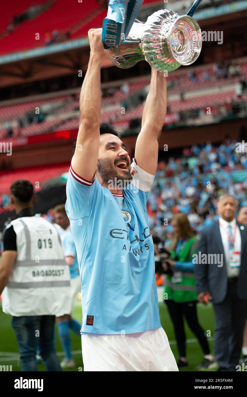 London, UK. 03rd June, 2023. İlkay Gündoğan of Manchester City lifts the trophy during the The FA Cup Final match between Manchester City and Manchester United at Wembley Stadium, London, England on 3 June 2023. Photo by Salvio Calabrese. Editorial use only, license required for commercial use. No use in betting, games or a single club/league/player publications. Credit: UK Sports Pics Ltd/Alamy Live News Stock Photo