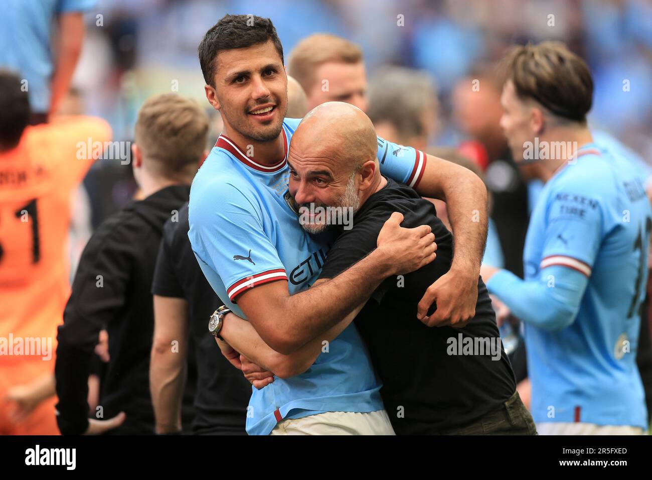 London, UK. 03rd June, 2023. Rodri of Manchester City and Manchester City Manager Pep Guardiola celebrate after the FA Cup Final match between Manchester City and Manchester United at Wembley Stadium on June 3rd 2023 in London, England. (Photo by Daniel Chesterton/phcimages.com) Credit: PHC Images/Alamy Live News Stock Photo