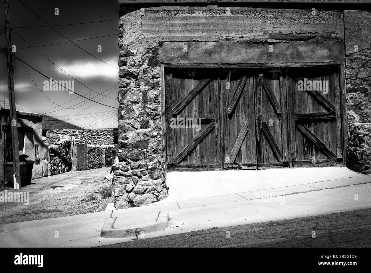 A wooden garage door in the Sunset Height area of El Paso, Texas Stock