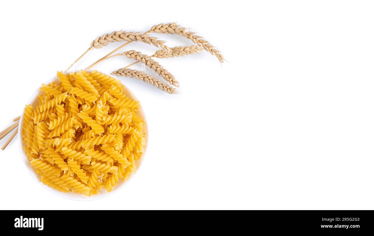 Pasta and wheat spikelets isolated on white background, banner, header ...