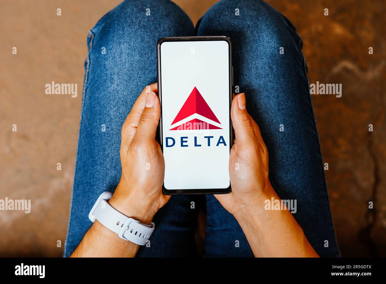 In this photo illustration, the Delta Air Lines logo is displayed on a smartphone screen. Stock Photo