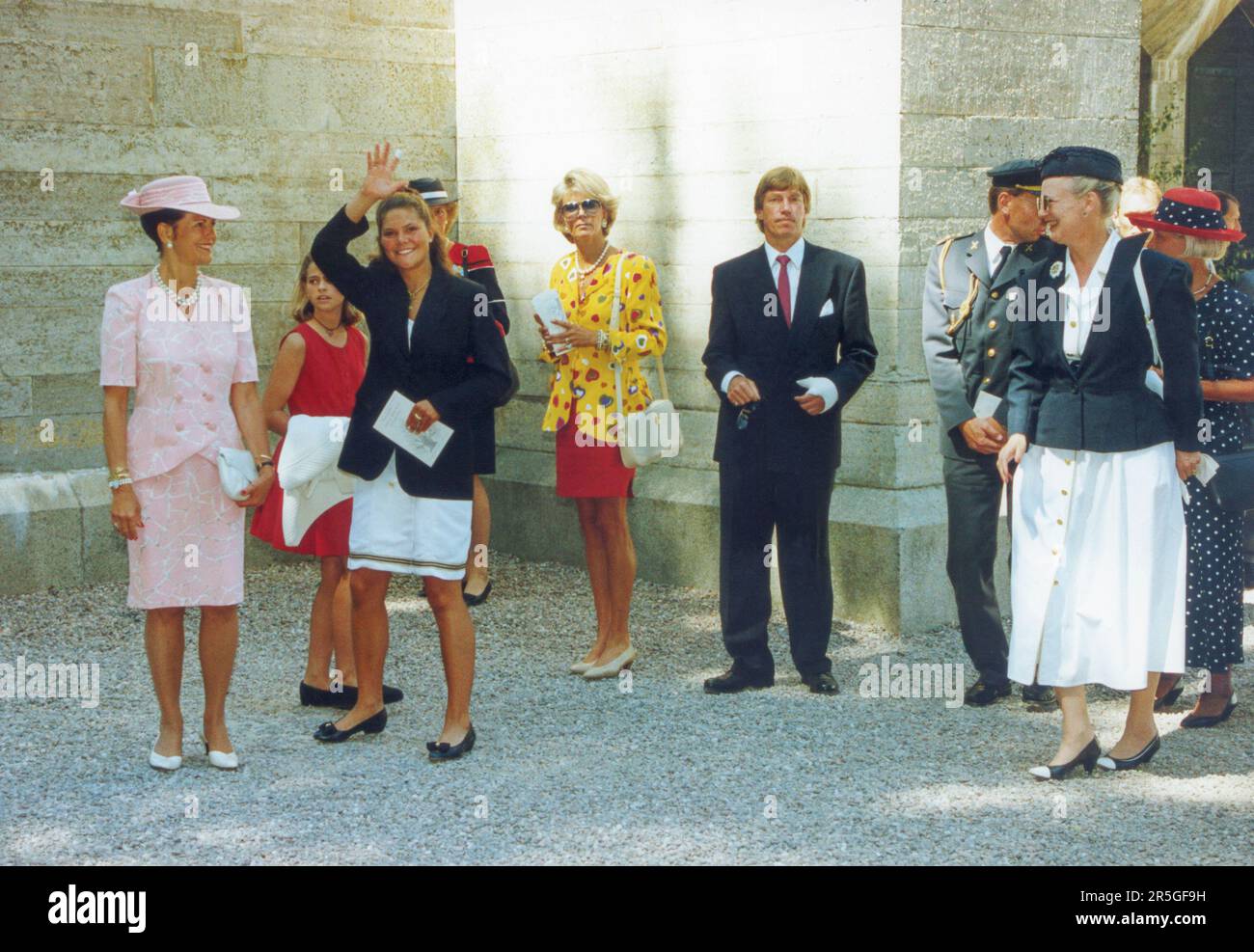 CROWN PRINCESS VICTORIA of Sweden wawing to people in Vadstena after Prince Carl Phlip´s confirmation service.Queen Silvia Princess Madelein and Princess Birgitta and a smiling Queen Margrethe of Denmark takes part in the courtship Stock Photo