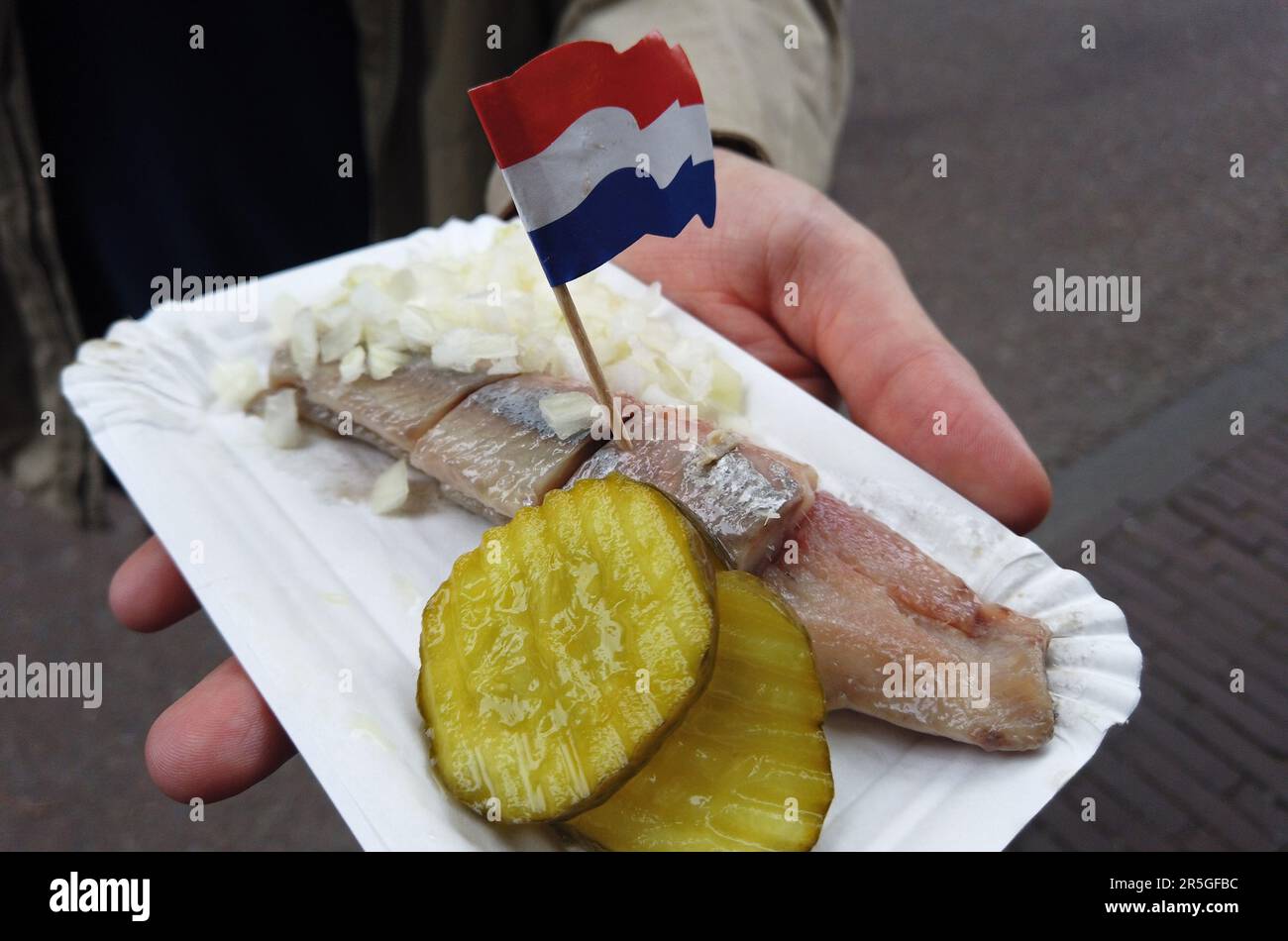 Herring served in a food kiosk in Amsterdam Netherlands Stock Photo Alamy