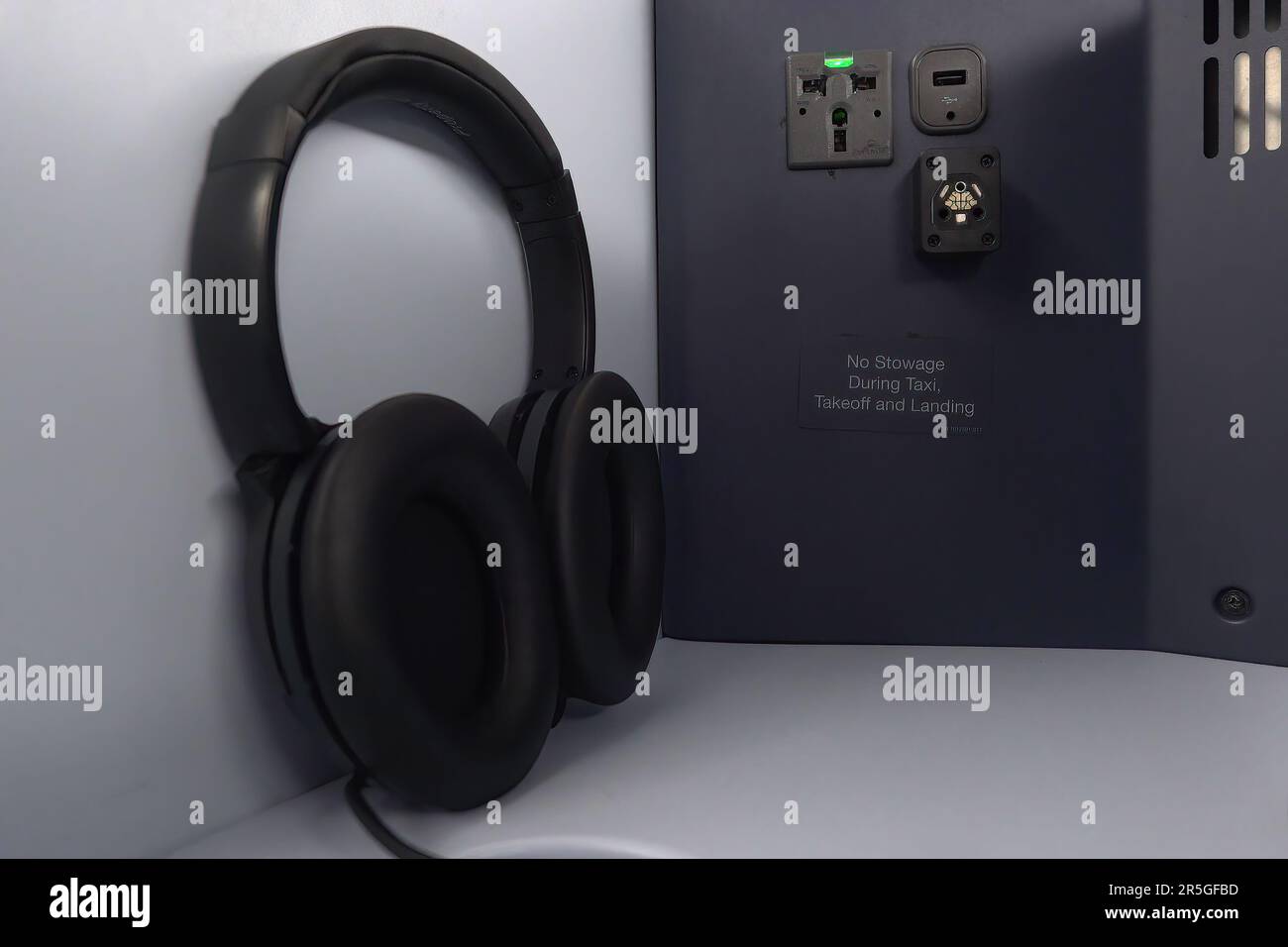 Charging ports at the Business class cabin of Boeing 777200 operated