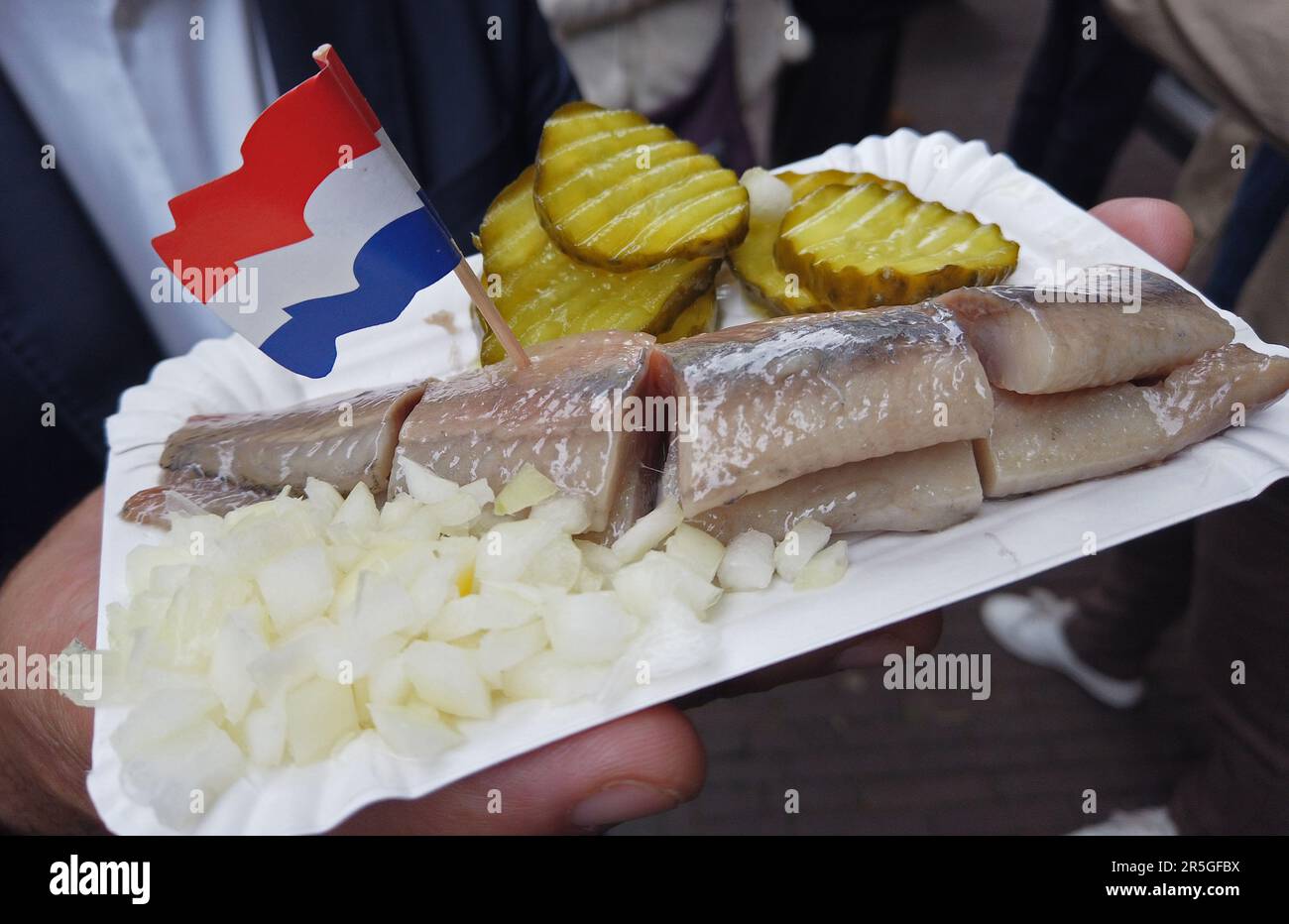 Herring served in a food kiosk in Amsterdam Netherlands Stock Photo Alamy