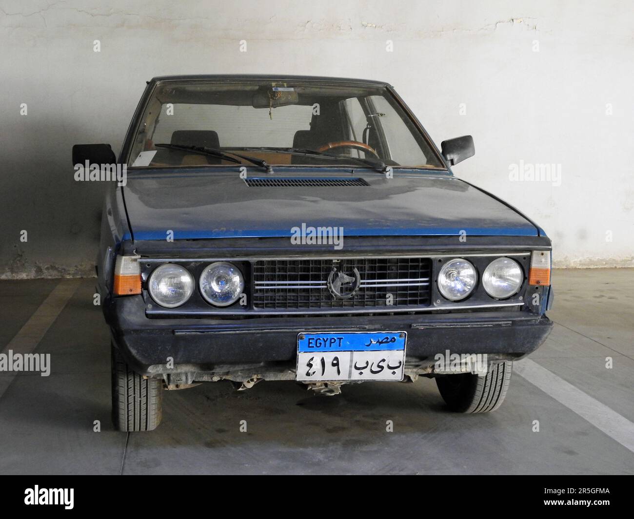 Cairo, Egypt, May 27 2023: an old vintage retro FIAT Polonez car in a garage with new Egyptian car plate numbers, selective focus of old vintage retro Stock Photo