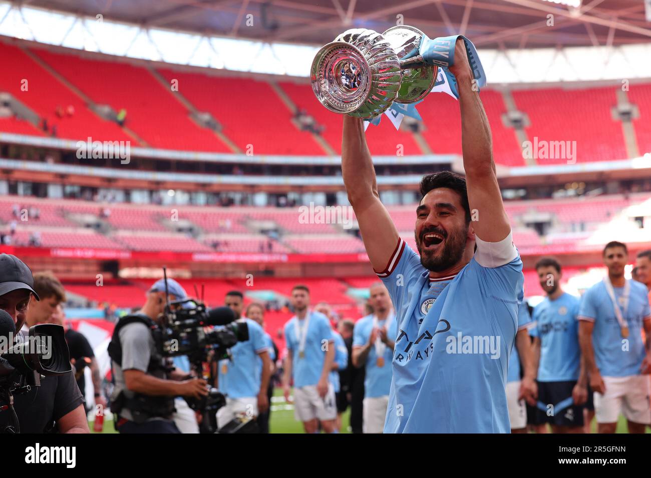 3rd June 2023;  Wembley Stadium, London, England; FA Cup Final Football, Manchester City versus Manchester United; Ilkay Gundogan of Manchester City celebrates with the FA Cup Stock Photo