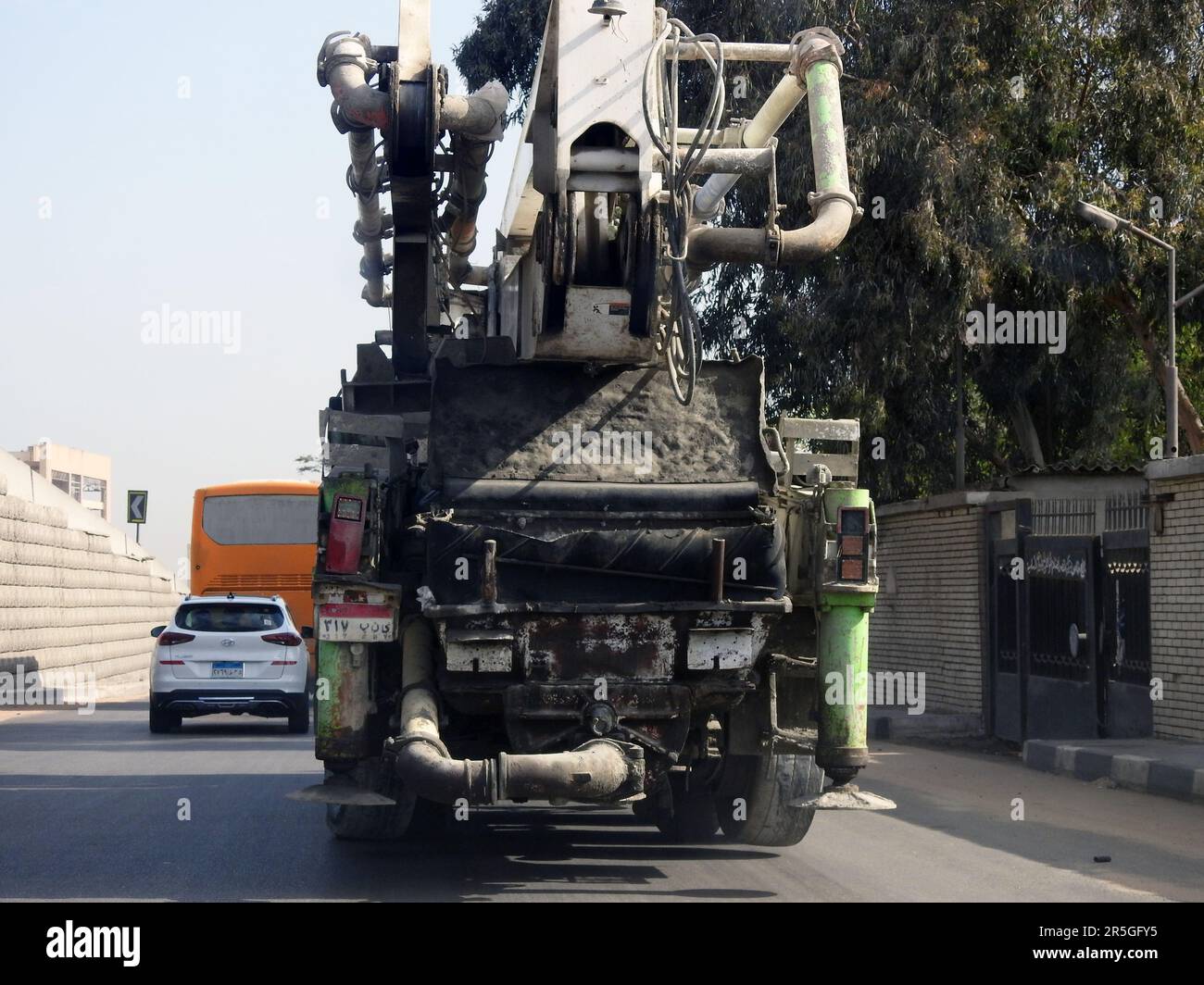 Cairo, Egypt, May 31 2023: A mobile crane truck on its way for construction work at a construction site in Egypt helping in logistics of infrastructur Stock Photo