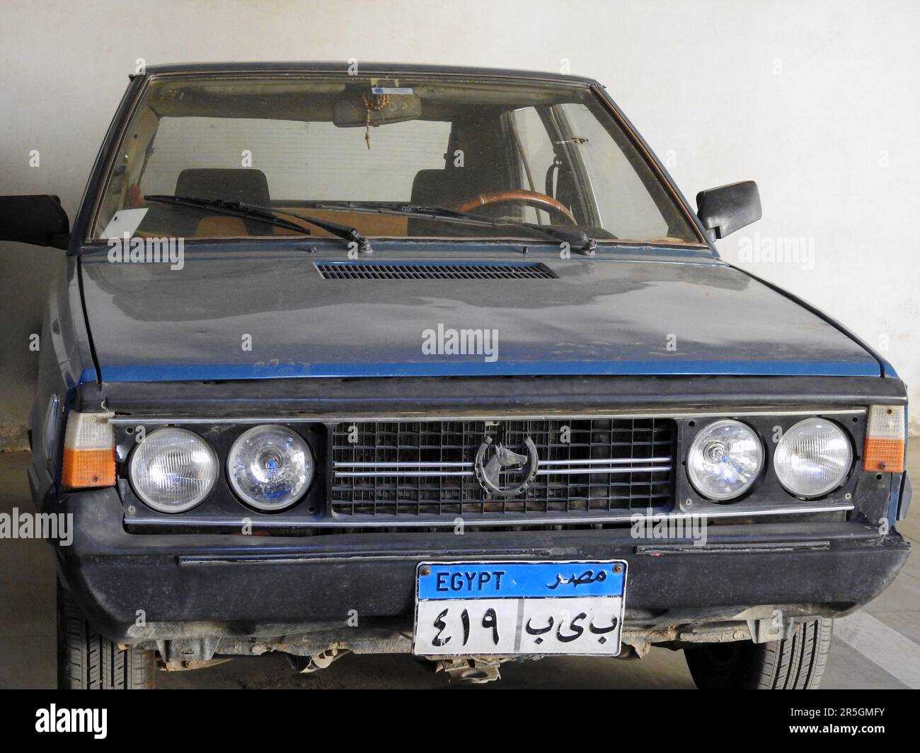 Cairo, Egypt, May 27 2023: an old vintage retro FIAT Polonez car in a garage with new Egyptian car plate numbers, selective focus of old vintage retro Stock Photo