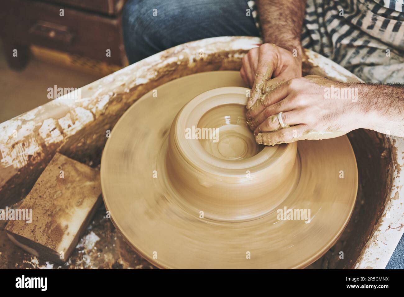 All things good are made with love. an unrecognisable man working with ...