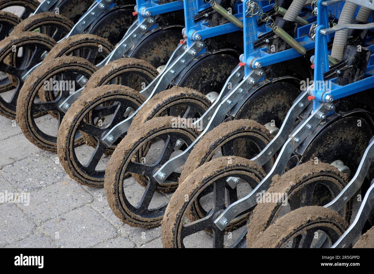 Agriculture Wheels of a seed drill Stock Photo Alamy
