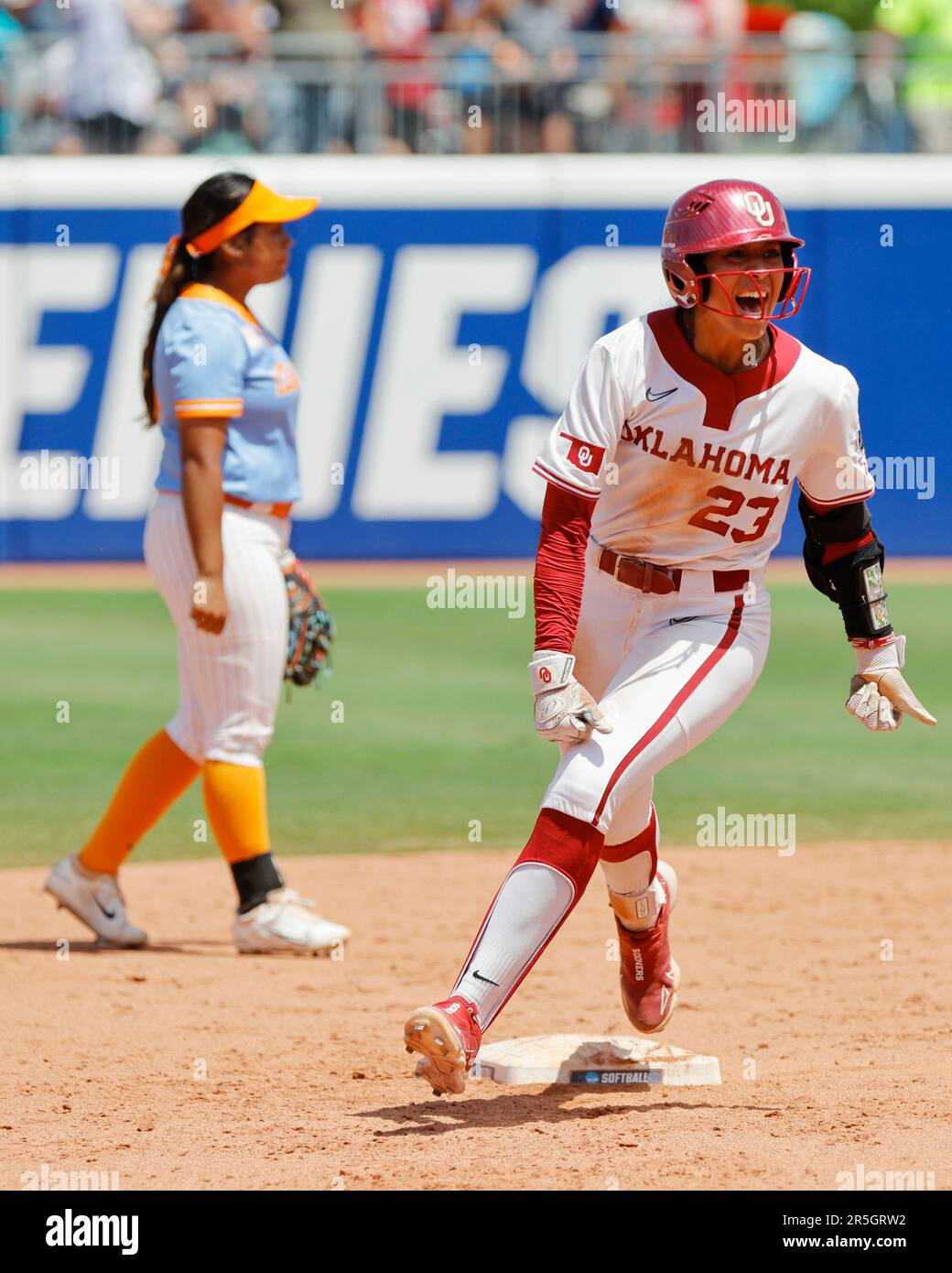 Oklahoma's Tiare Jennings (23) celebrates as she runs the bases after