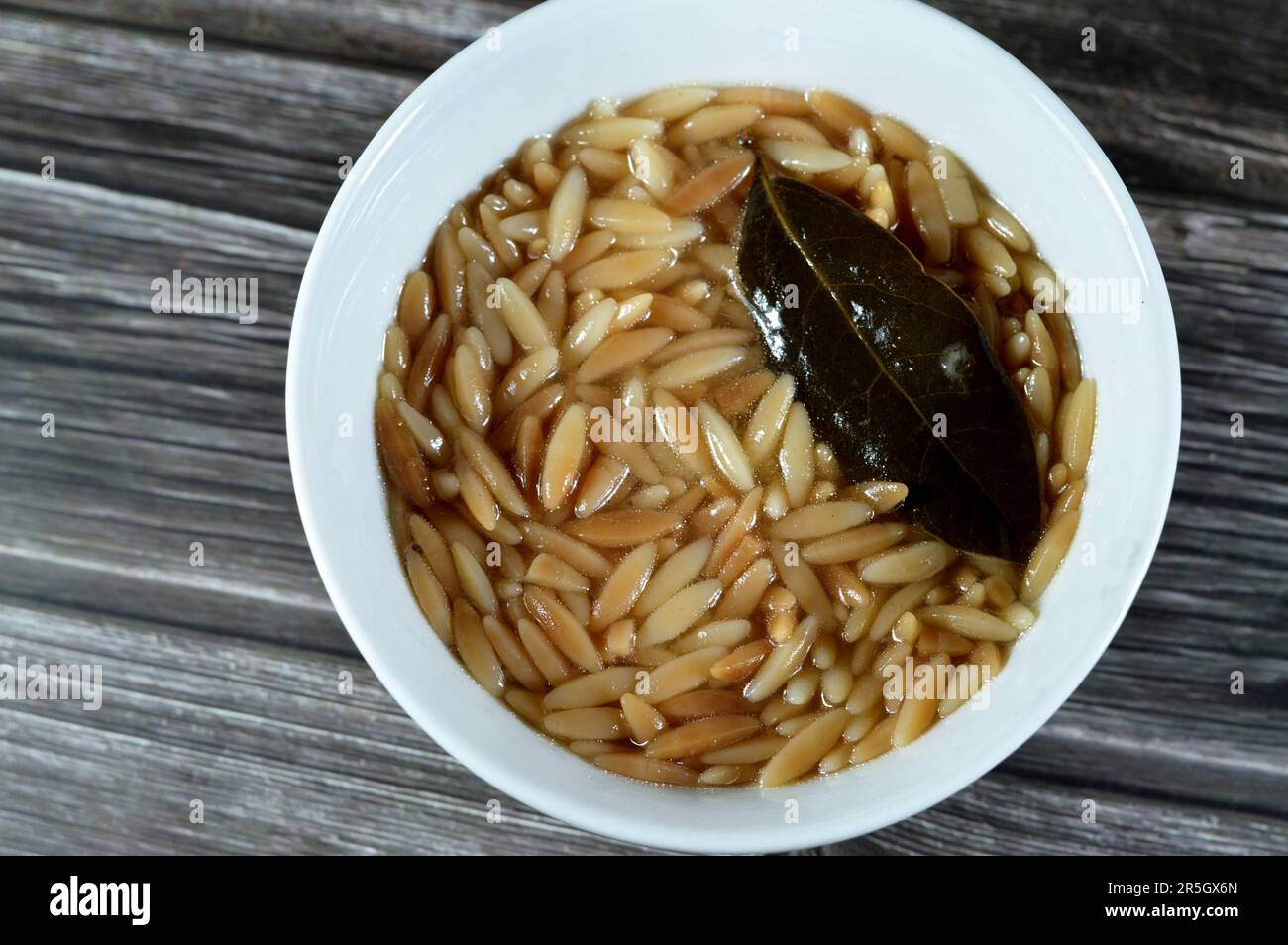 Middle Eastern Orzo Pasta Egyptian soup also known as Shorbet Lesan El