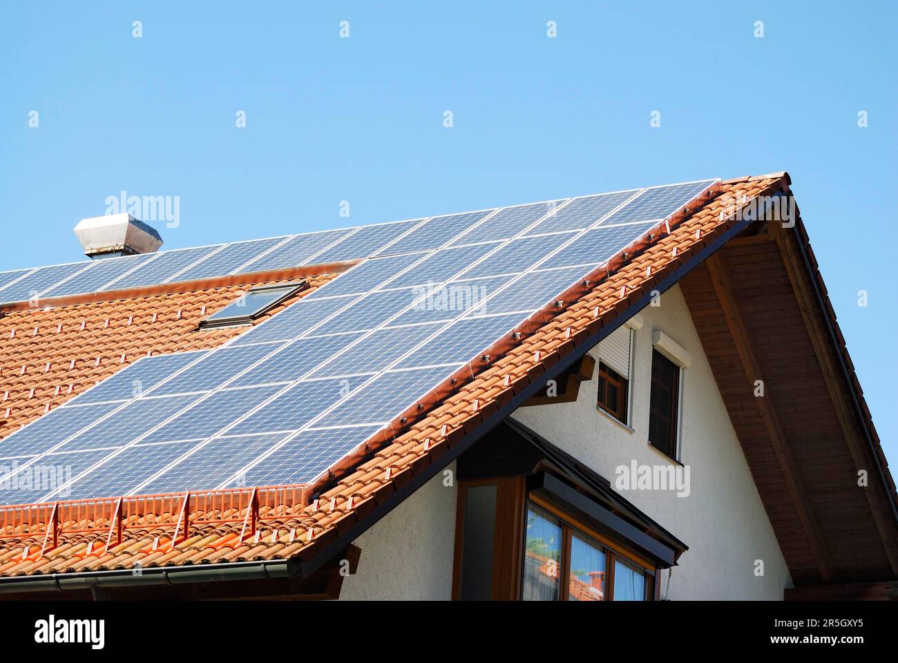 Photovoltaic on the roof of a house Stock Photo