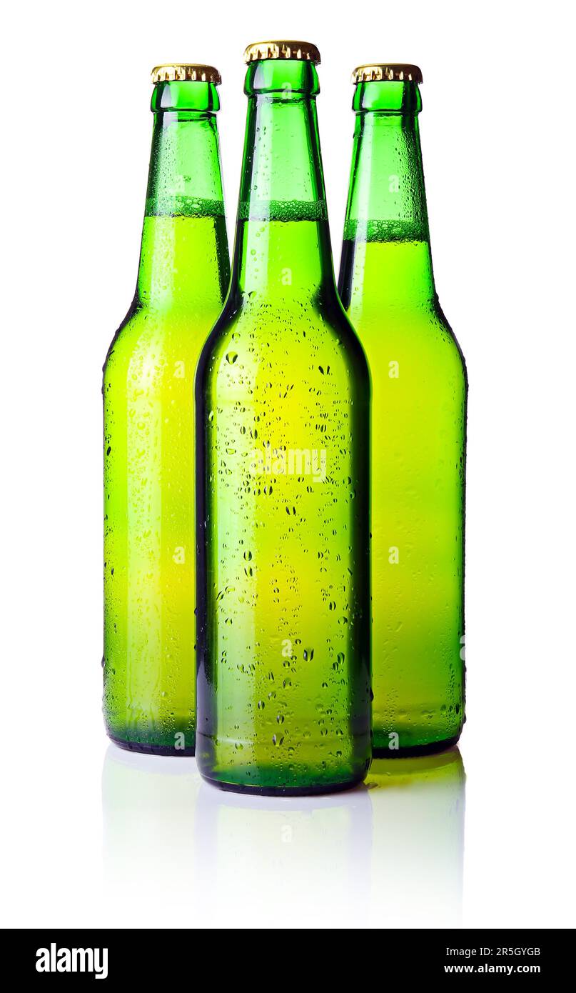 Three green bottles of beer isolated on white background Stock Photo