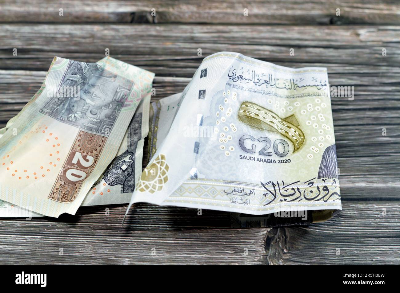 Crumpled Egyptian 20LE Twenty Pounds And Saudi Arabia Money Of 20 SAR crumpled-egyptian-20le-twenty-pounds-and-saudi-arabia-money-of-20-sar