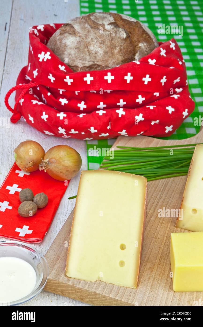 Appenzell bread kas, traditional Swiss dish, cheese, bread, onions, nutmeg, chives Stock Photo
