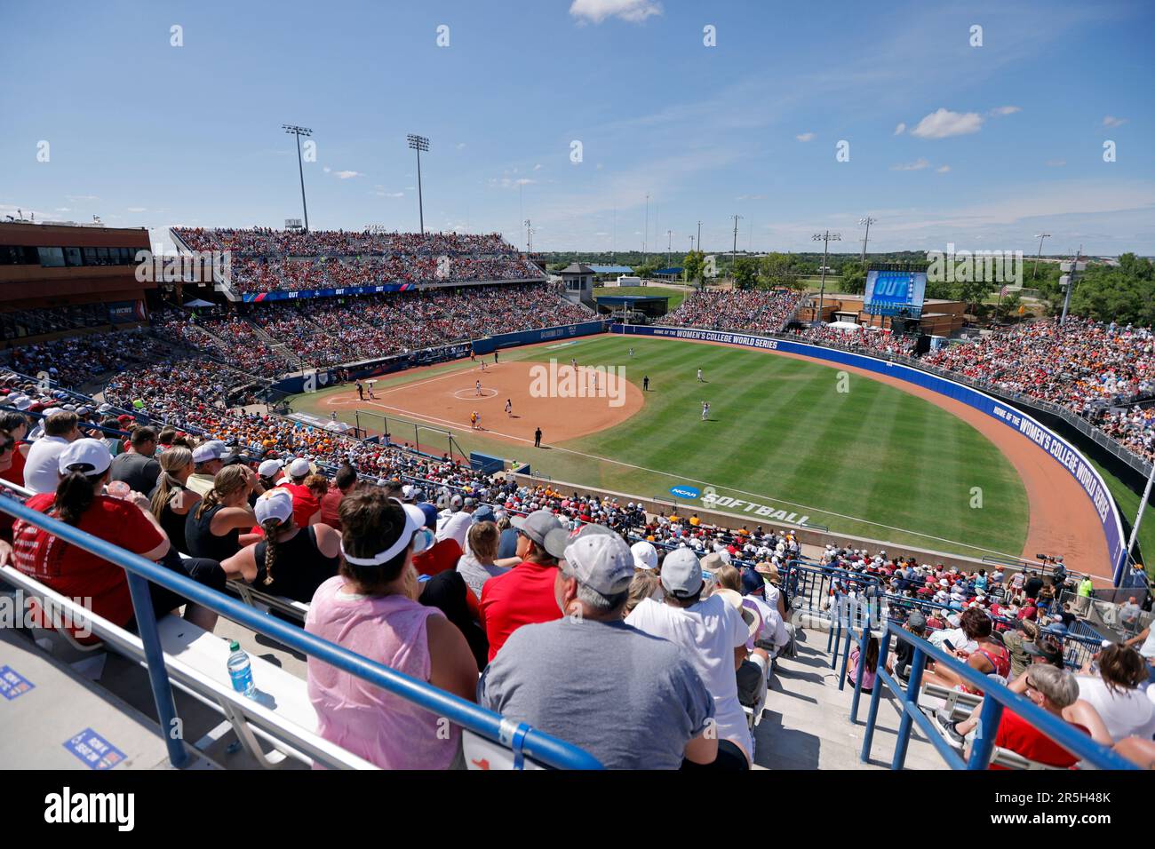 Softball fans watch Oklahoma and Tennessee play during the fourth