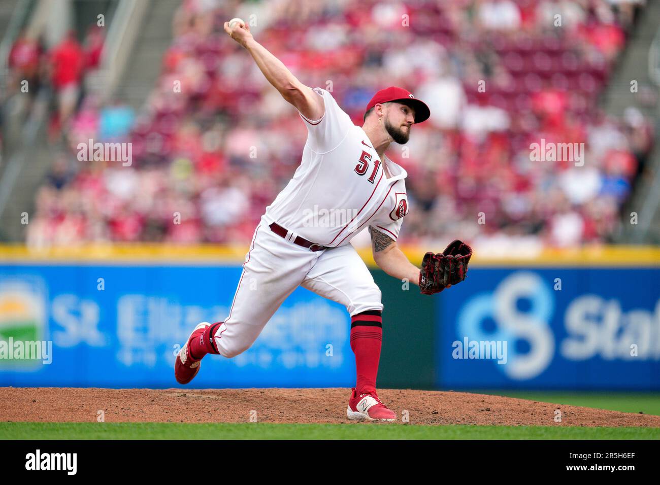 Cincinnati Reds starting pitcher Graham Ashcraft throws against the