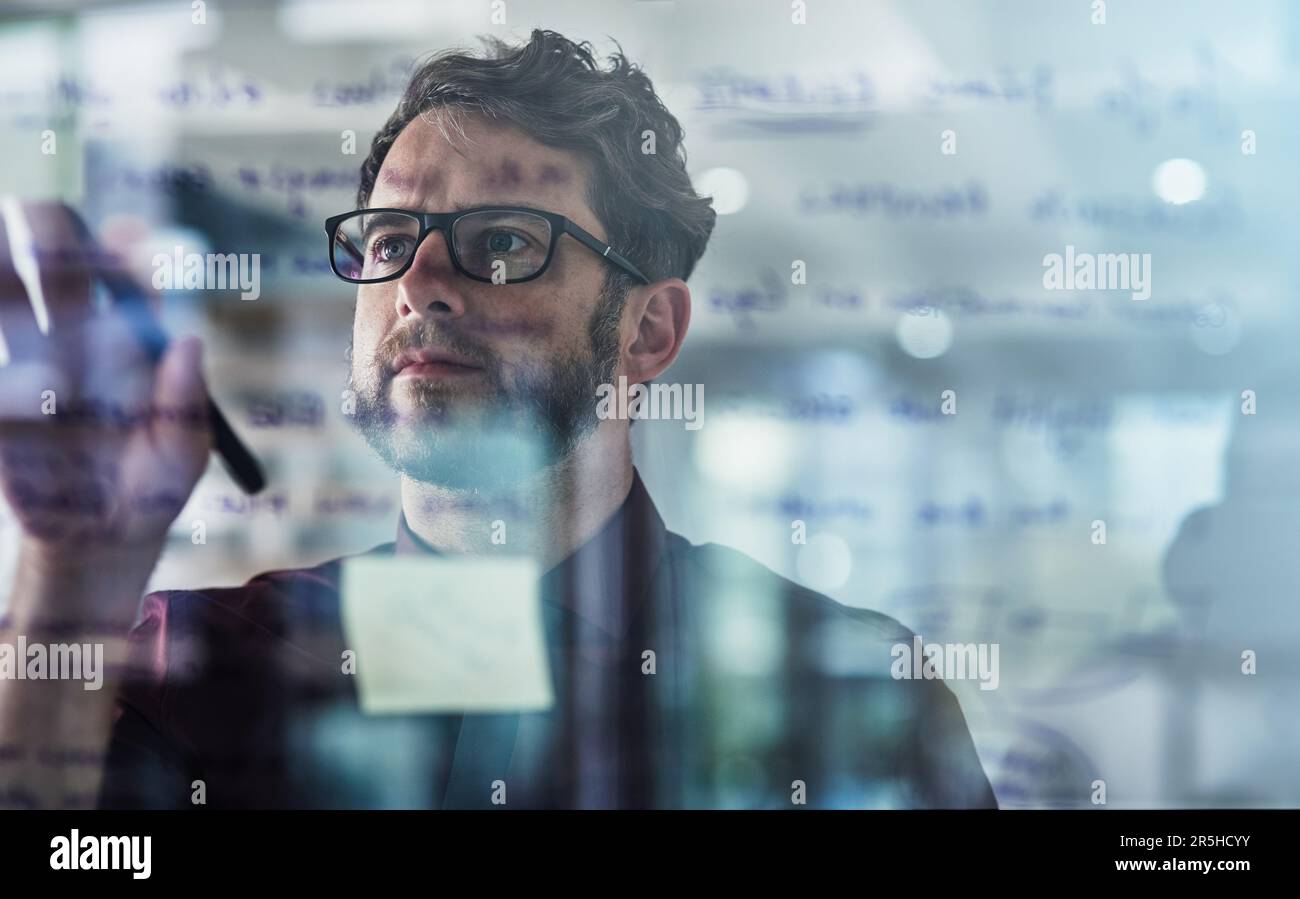 Stimulating creative thought with a brainstorming session. a young ...