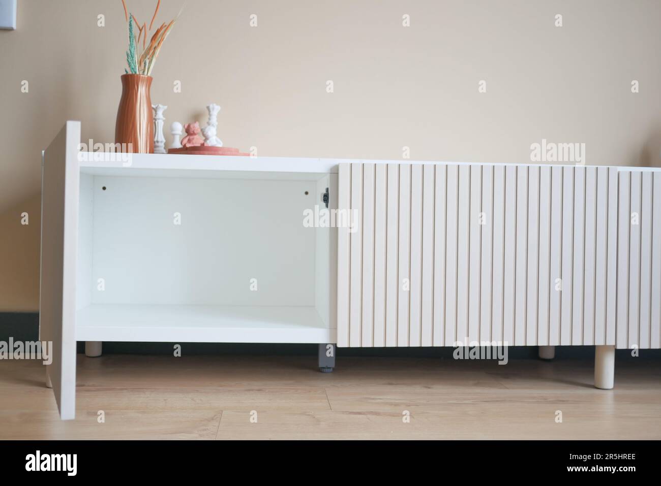 opened empty drawer in living room Stock Photo - Alamy