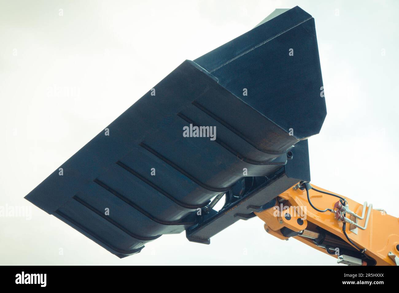 Shovel of excavator or bulldozer. Detail of part of hydraulic and
