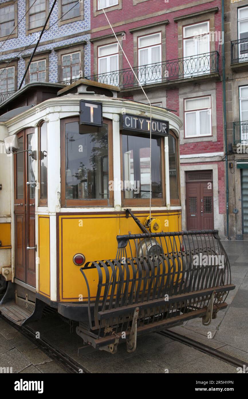 A old tram in Porto Portugal. These Trams form part of the transport network and a popular with Tourists and Local alike Stock Photo
