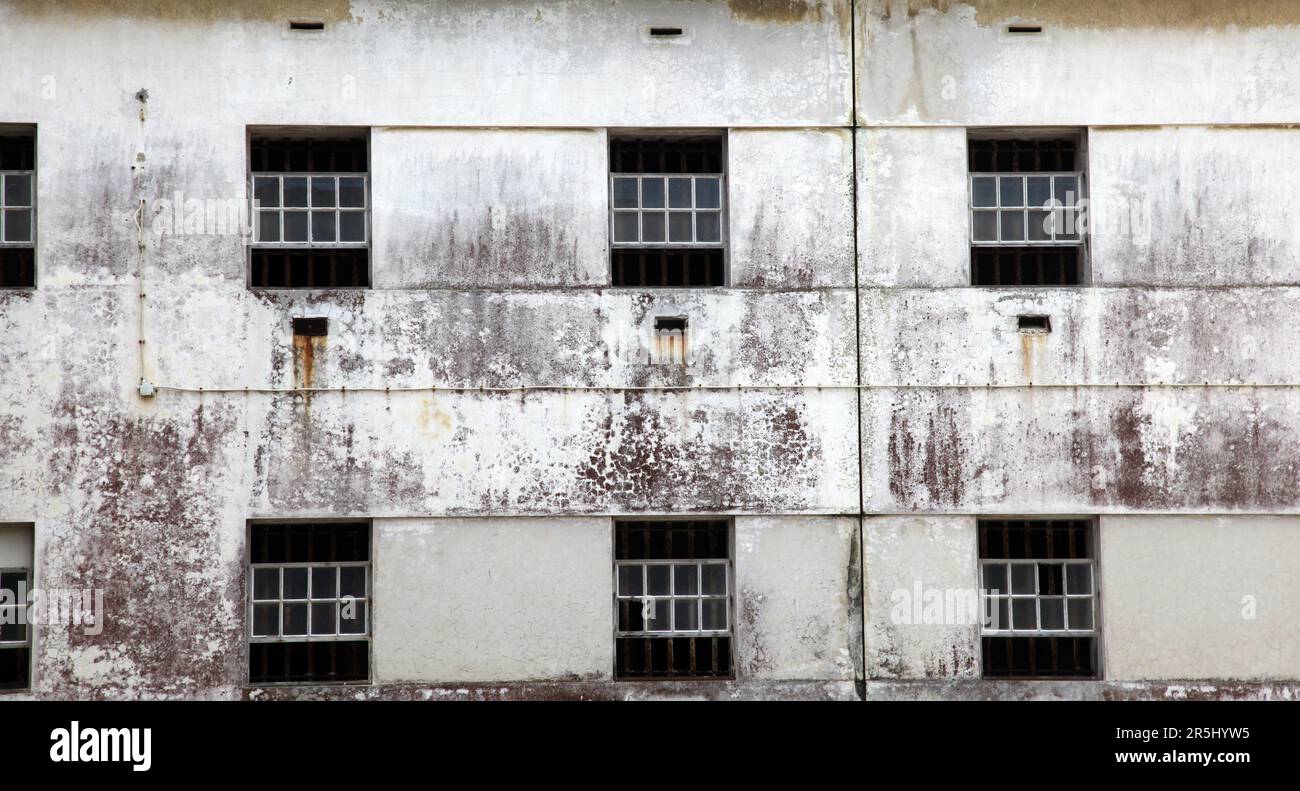 The windows of an abandoned prison in Peniche Portugal. Stock Photo