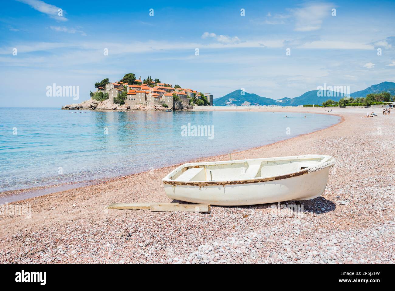 A small fishing boat seen on Ivano Vidoni Beach in front of the