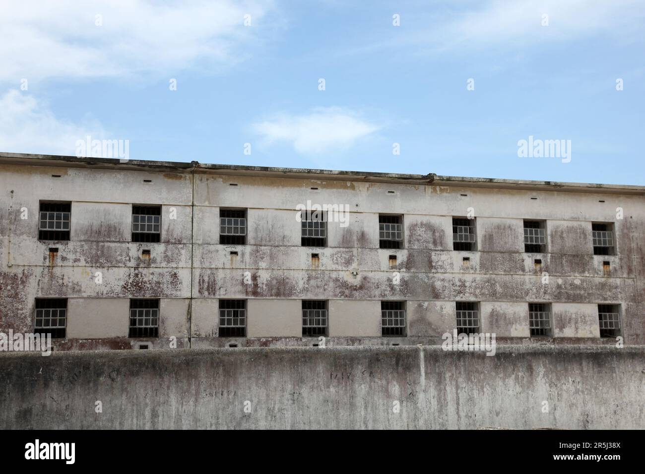 The windows of an abandoned prison in Peniche Portugal. Stock Photo