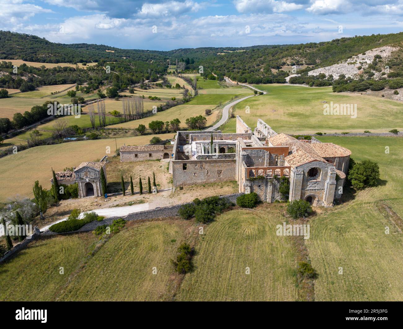 Aerial view Monsalud Cistercian Monastery, in Corcoles, was one of the most important medieval buildings in the territory of Guadalajara for centuries Stock Photo