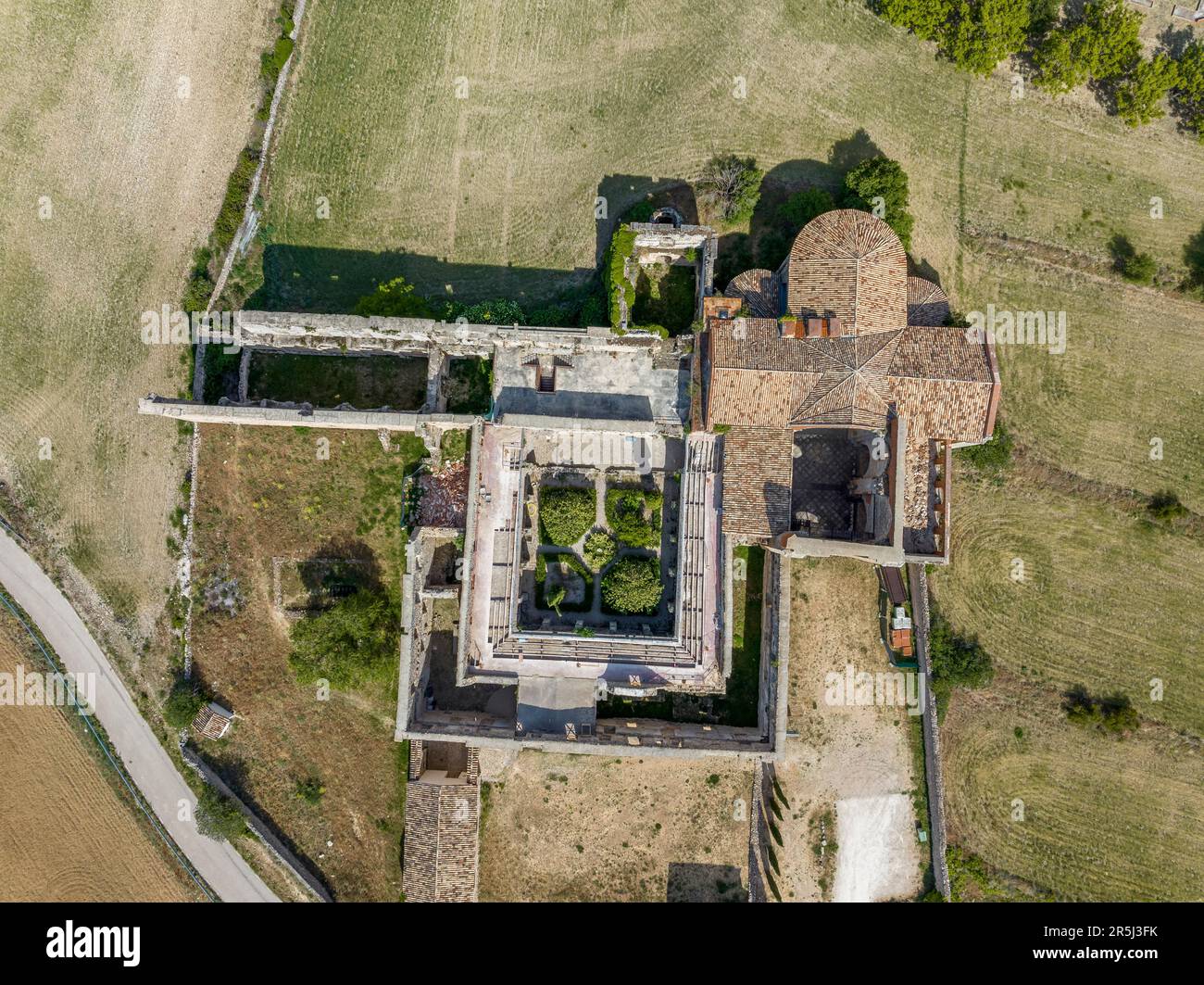 Aerial view Monsalud Cistercian Monastery, in Corcoles, was one of the most important medieval buildings in the territory of Guadalajara for centuries Stock Photo