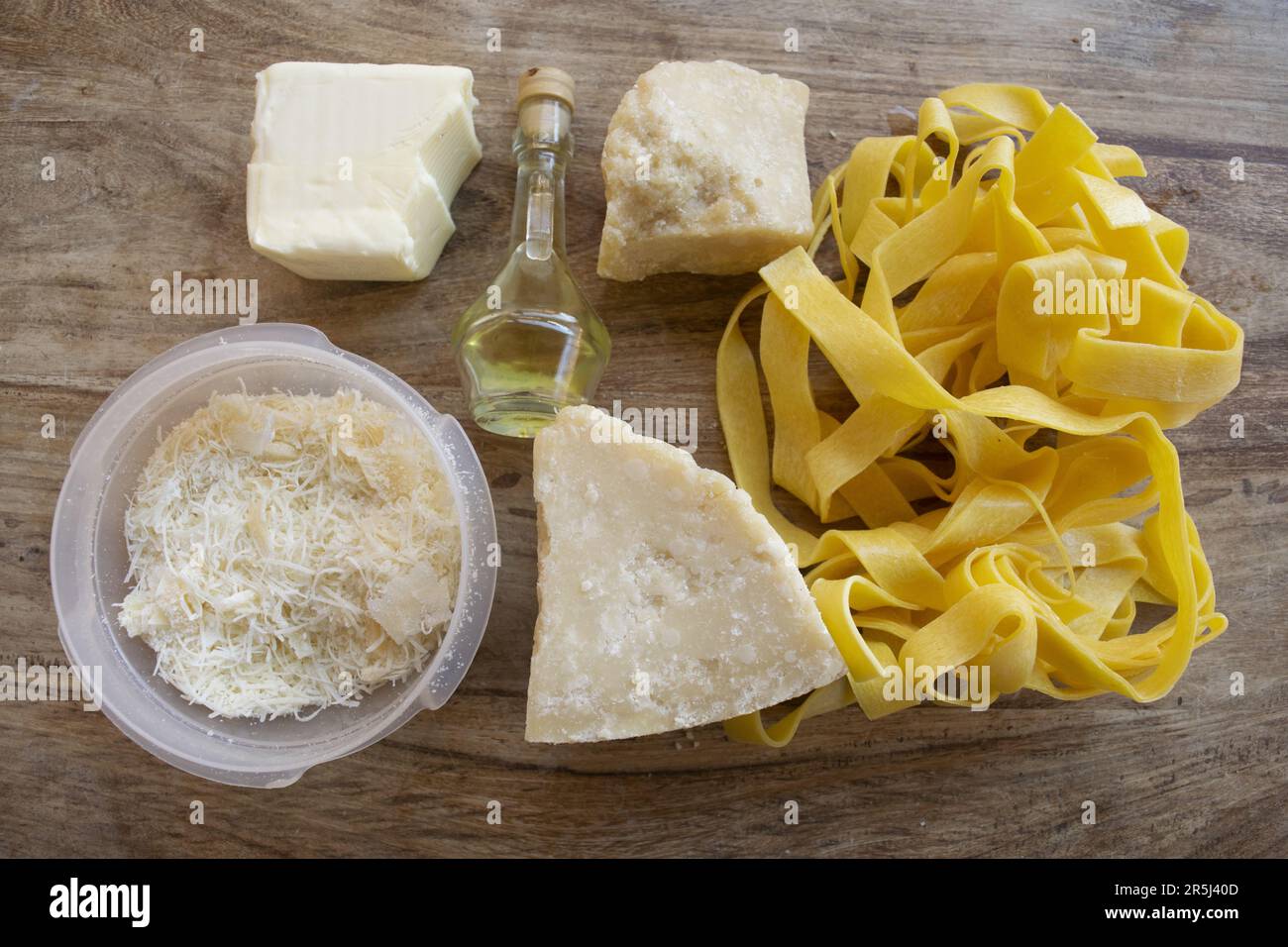 ingredients to making fettuccine Alfredo with butter parmesan cheese